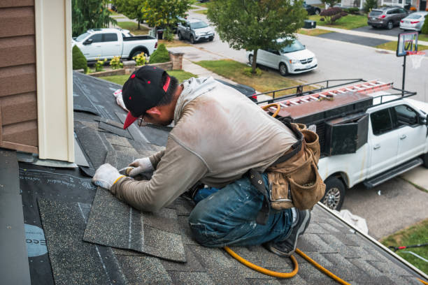 Professional Roofing technician working in Copiague, NY
